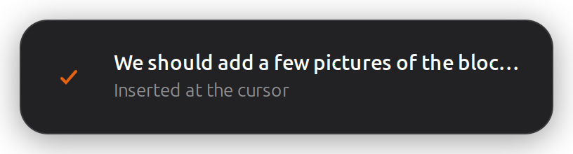 The whisper-desk overlay after a successful dictation
